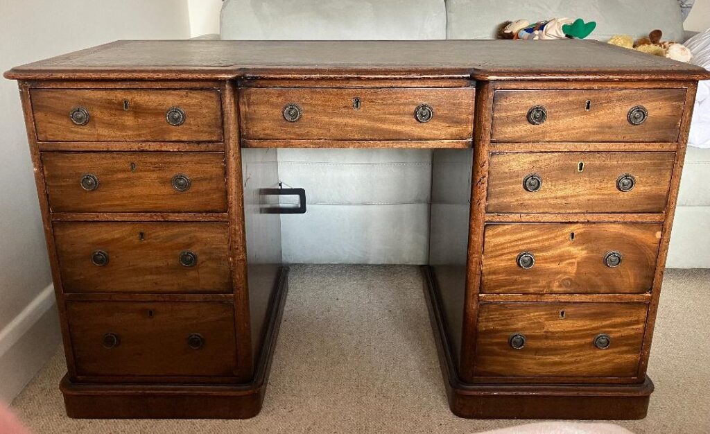 Victorian faded mahogany kneehole desk. Dorking Desks